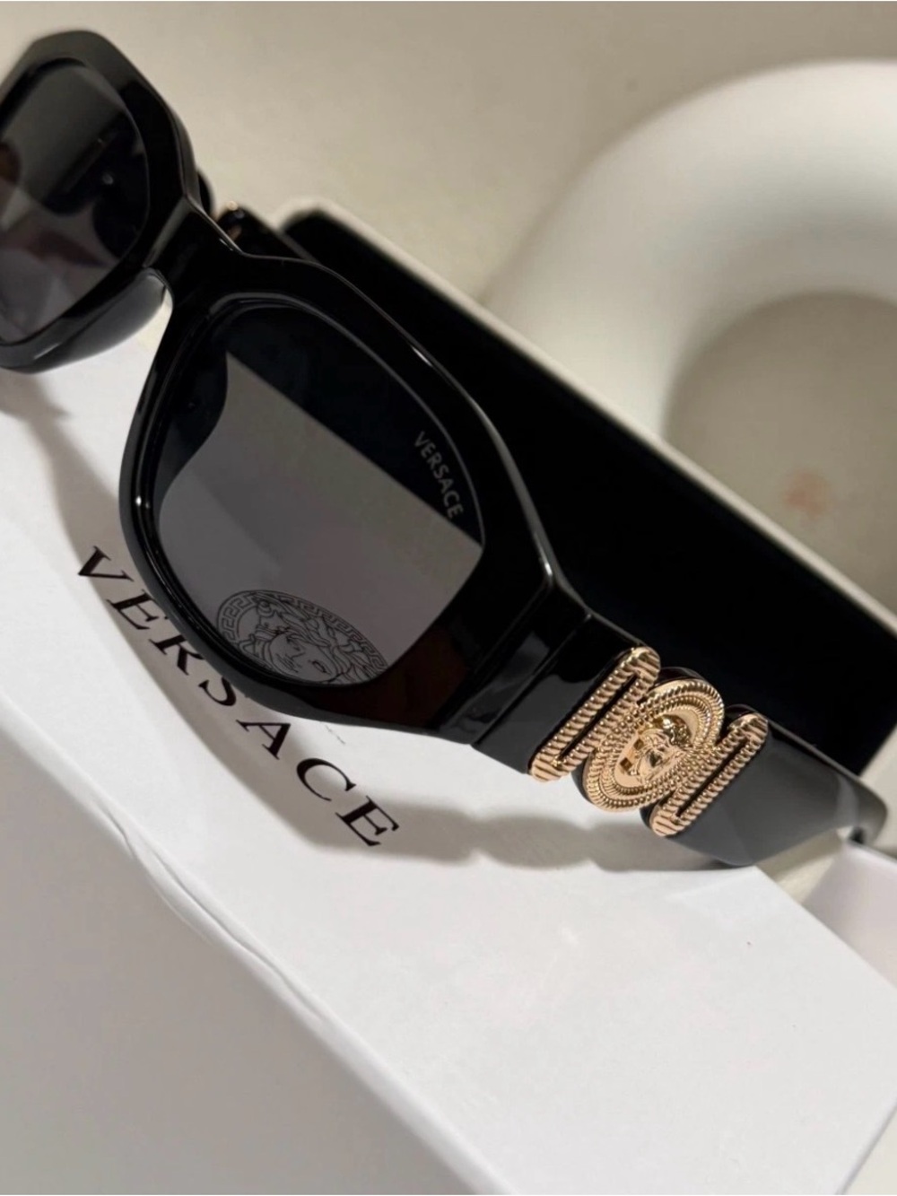 Versace Black Frame Sunglasses with Dark Lenses